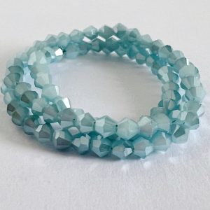 Tira de cristal Electrochapado Biconico color Azul  Medida 4mm